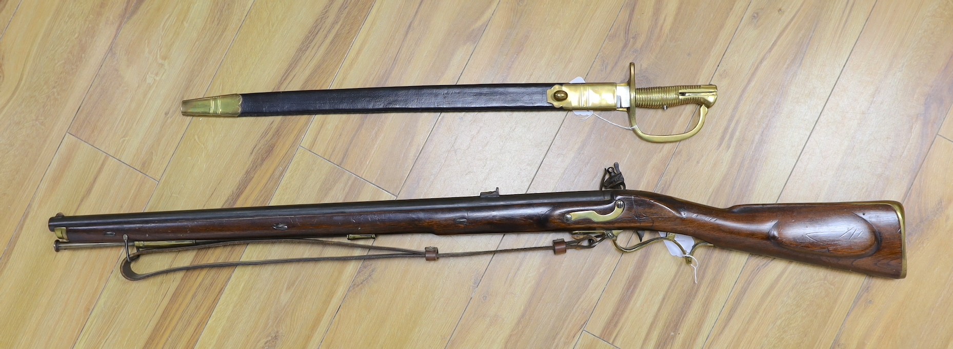 A Brown Bess East India Company musket, refubished, with later bayonet